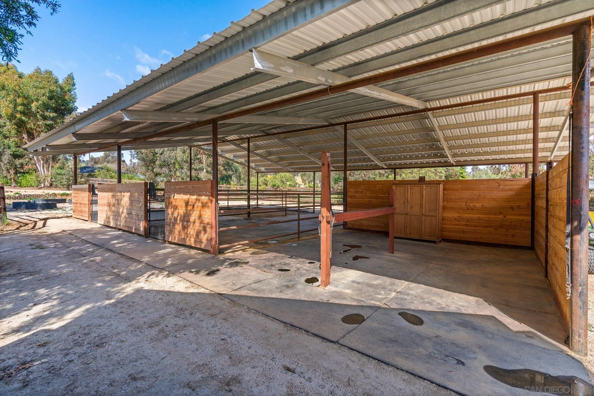 3355 Dove Hollow Road Encinitas, CA 92024 - Photo 28 of 37 a view of a garage with wooden wall