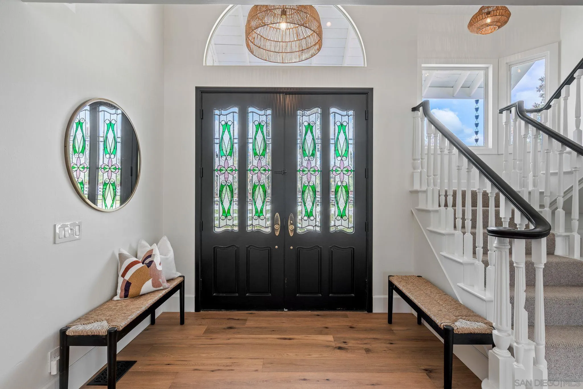 3355 Dove Hollow Road Encinitas, CA 92024 - Photo 4 of 37 a view of a hallway with wooden floor and entryway