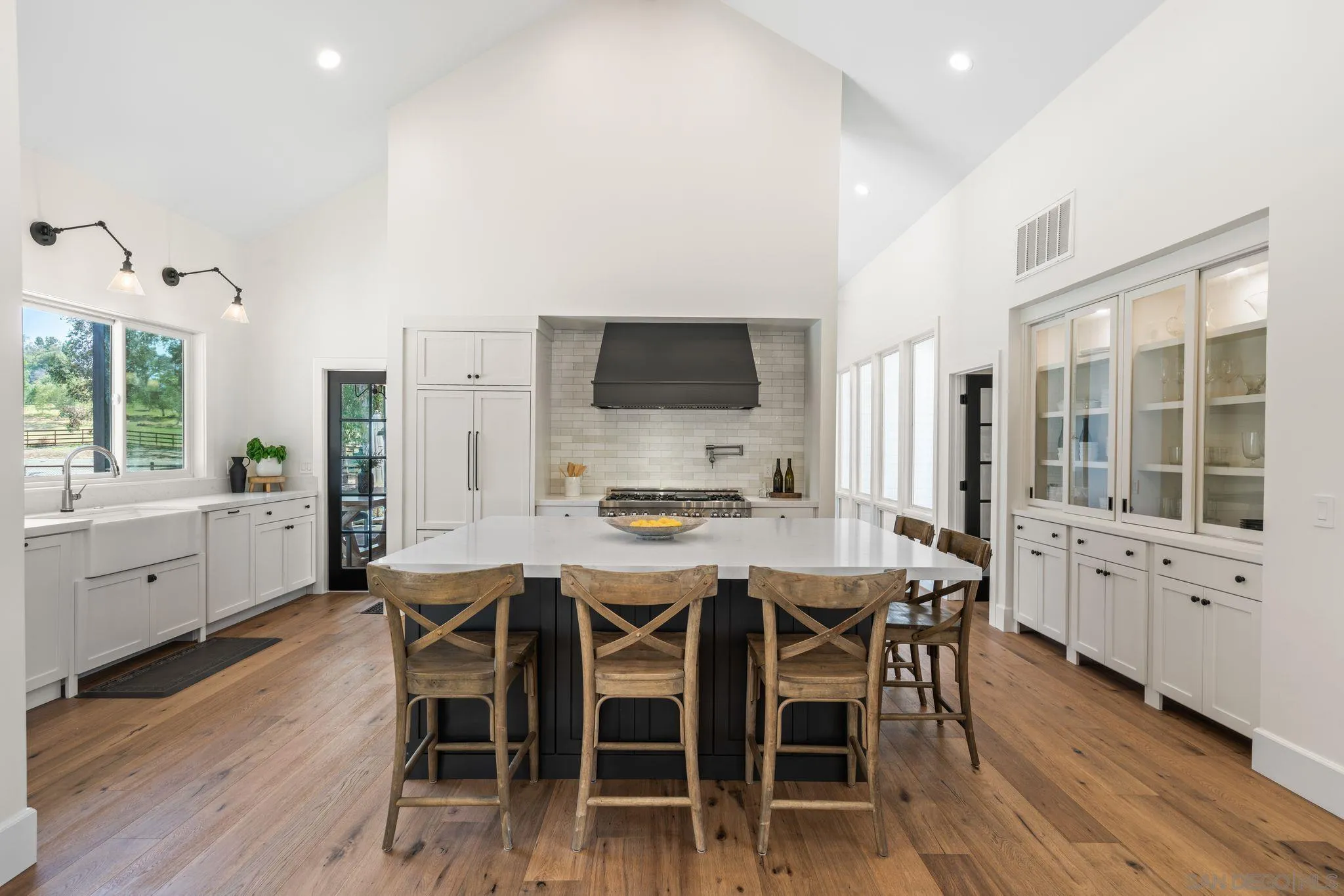 3355 Dove Hollow Road Encinitas, CA 92024 - Photo 9 of 37 a view of a dining room with furniture window and wooden floor
