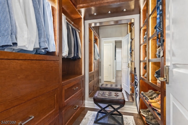206 Echo Ridge Way, Unit 206 Mountainside, NJ 07092 - Photo 18 of 35 a bathroom with a sink a toilet and a mirror
