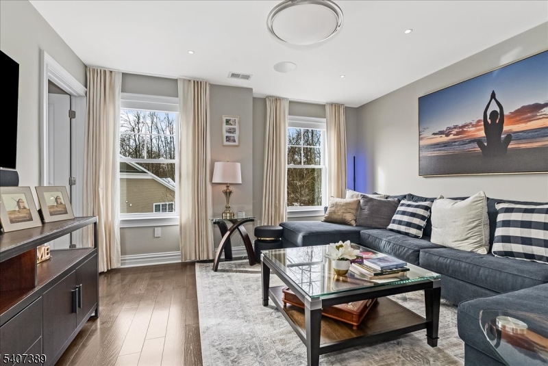 206 Echo Ridge Way, Unit 206 Mountainside, NJ 07092 - Photo 23 of 35 a living room with furniture and a window