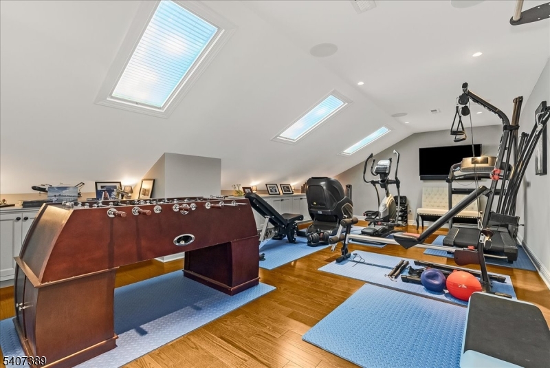 206 Echo Ridge Way, Unit 206 Mountainside, NJ 07092 - Photo 25 of 35 a view of a room with gym equipment