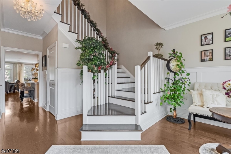 206 Echo Ridge Way, Unit 206 Mountainside, NJ 07092 - Photo 3 of 35 a view of entryway with livingroom and wooden floor