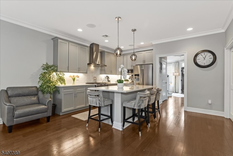 206 Echo Ridge Way, Unit 206 Mountainside, NJ 07092 - Photo 7 of 35 a view of a dining room with furniture