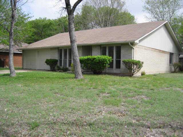 1901 Ridgetop Drive Round Rock, TX 78664 - Photo 1 of 1 a front view of a house with garden