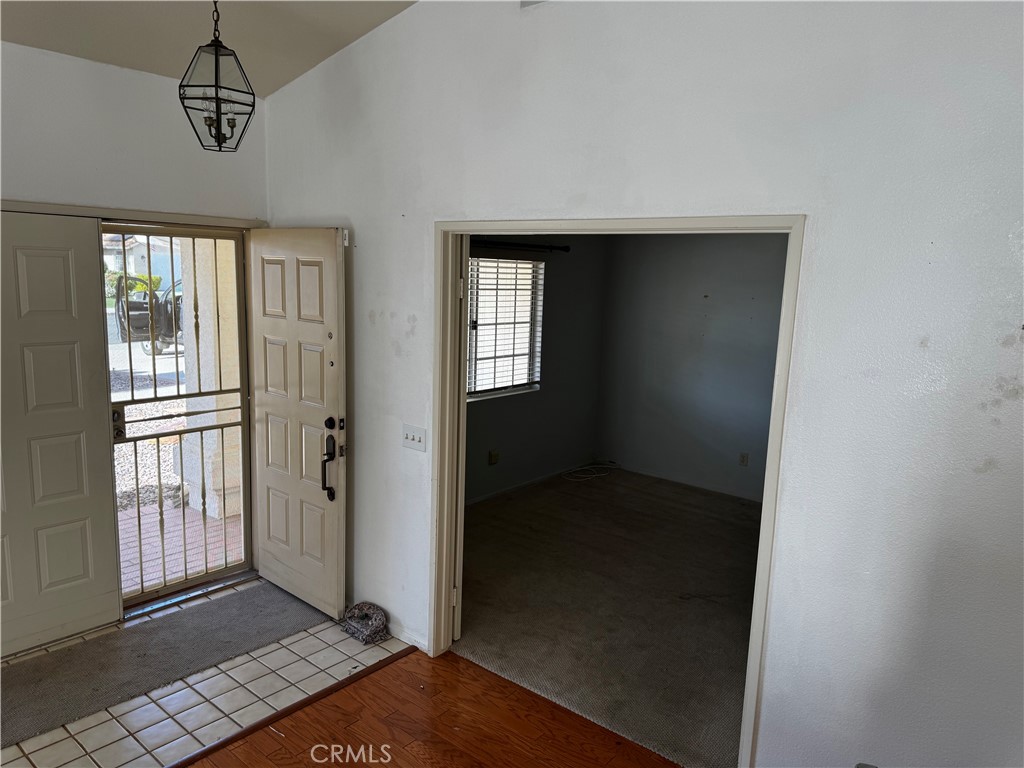 27519 Terrytown Road Menifee, CA 92586 - Photo 17 of 31 Looking entry and 1st bedroom