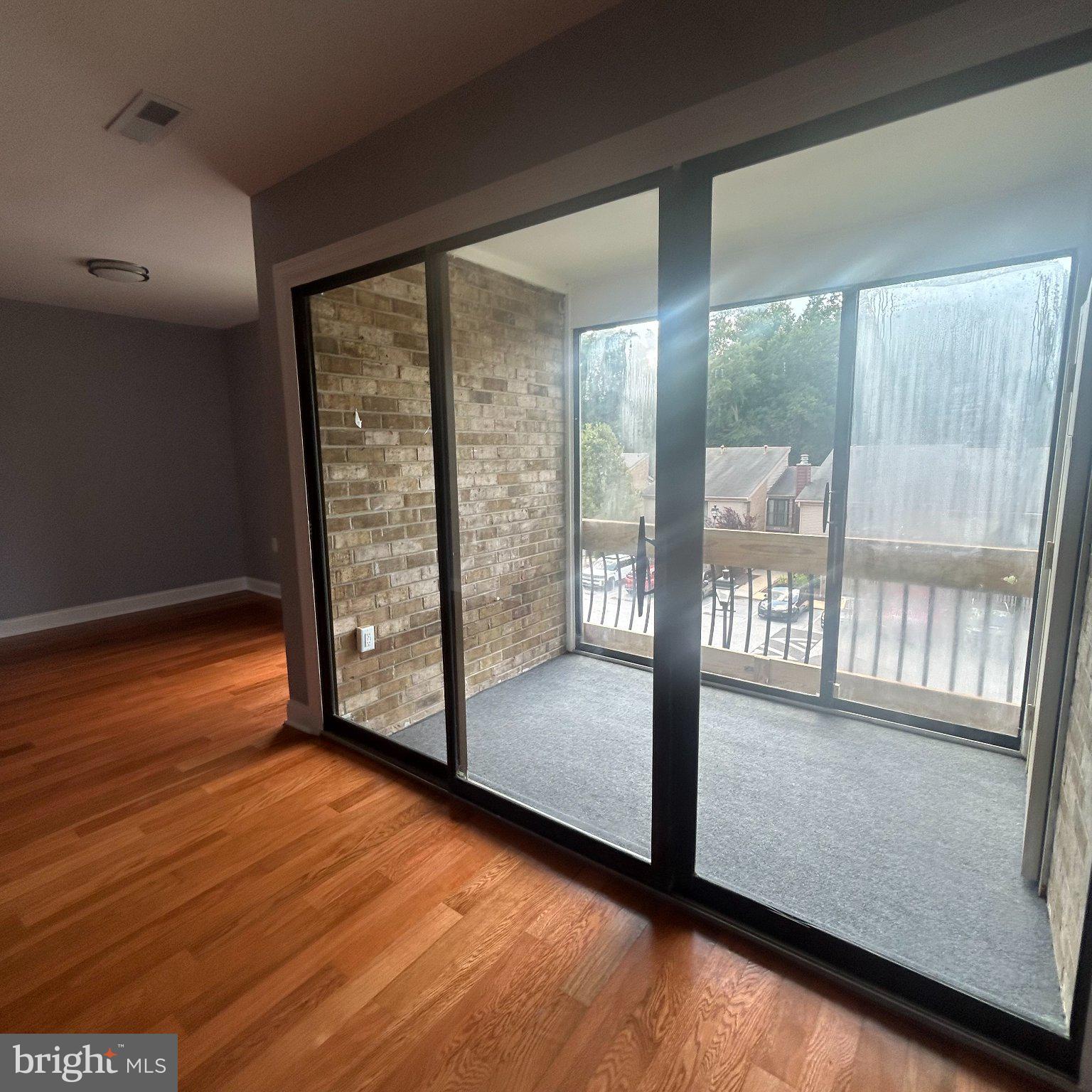 10549 Twin Rivers Road, Unit E1 Columbia, MD 21044 - Photo 9 of 20 Bright indoor-outdoor living space.