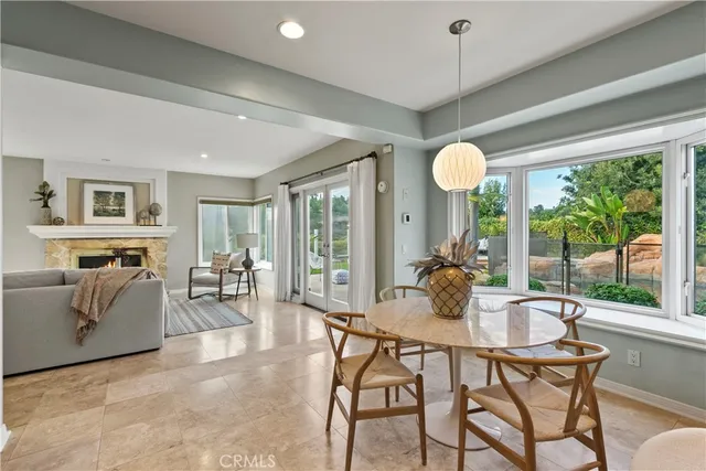 a view of cabinets with wooden floor and windows