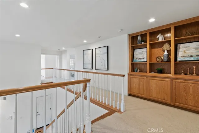 a white bath tub sitting next to a window