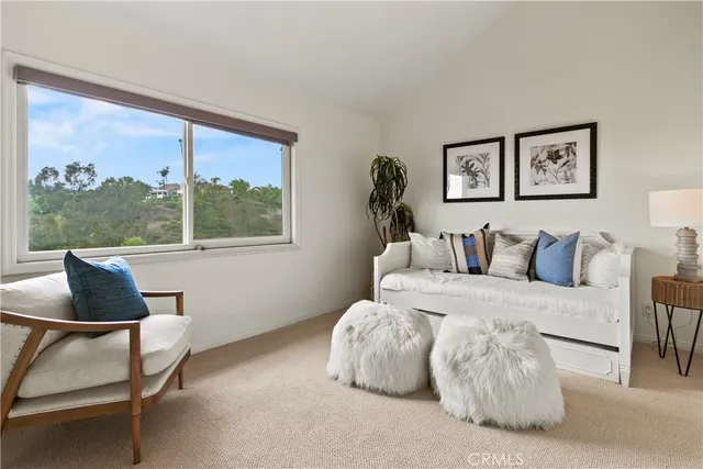 a view of a swimming pool and lounge chair