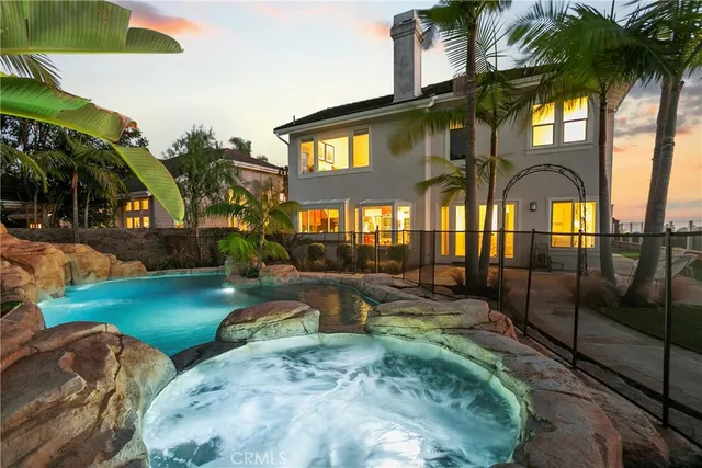 a view of a chair and tables in the patio
