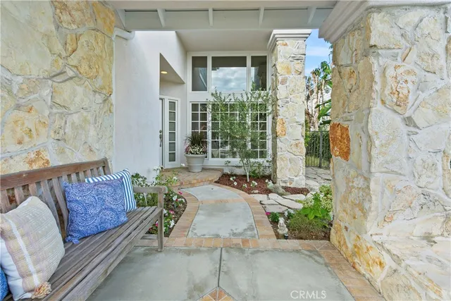 a living room with furniture or stairs and a wooden floor