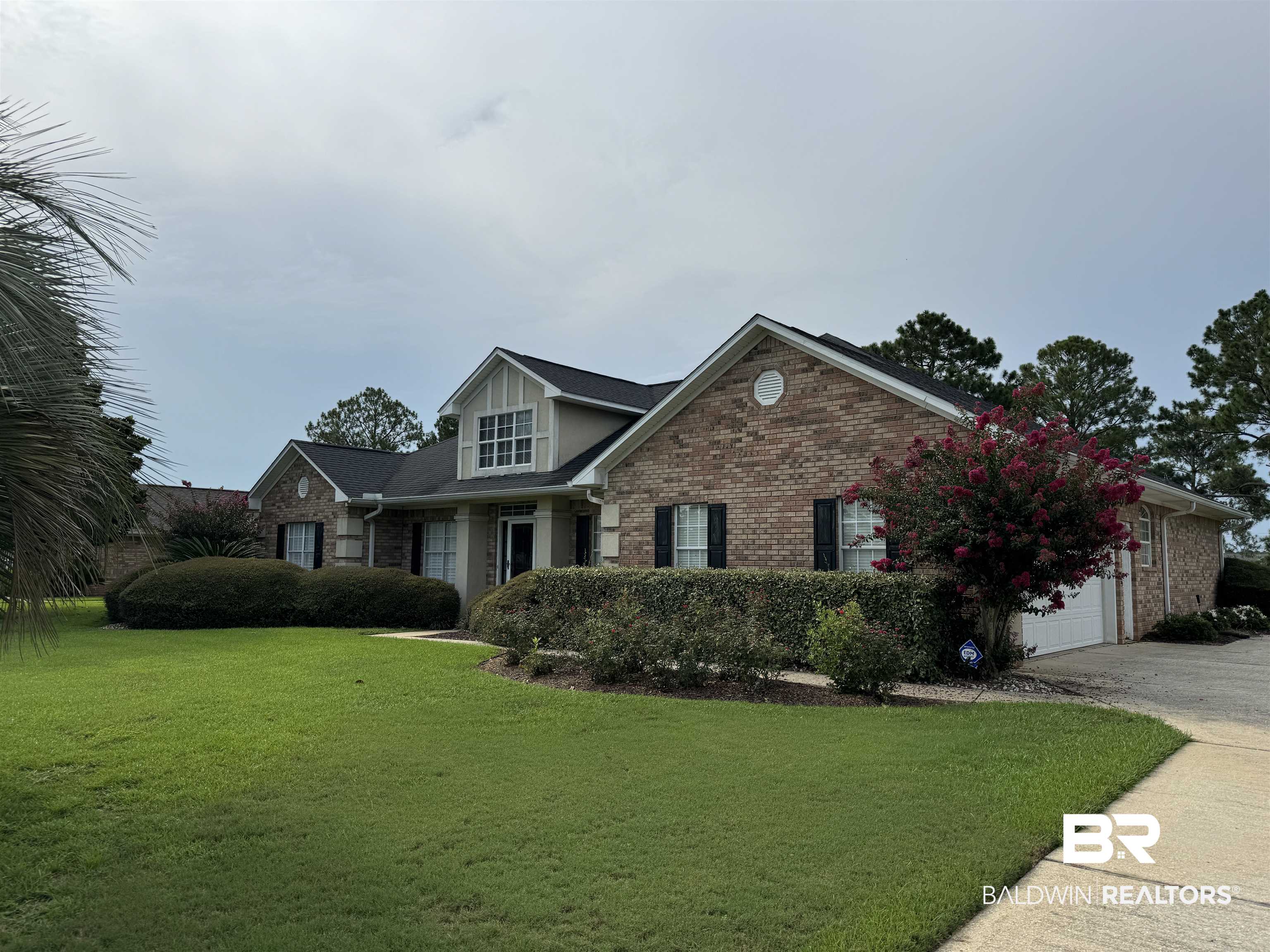 9139 Clubhouse Drive Foley, AL 36535 - Photo 2 of 30 View of front of home with a garage and a front yard