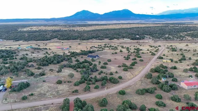 a view of beach and mountain