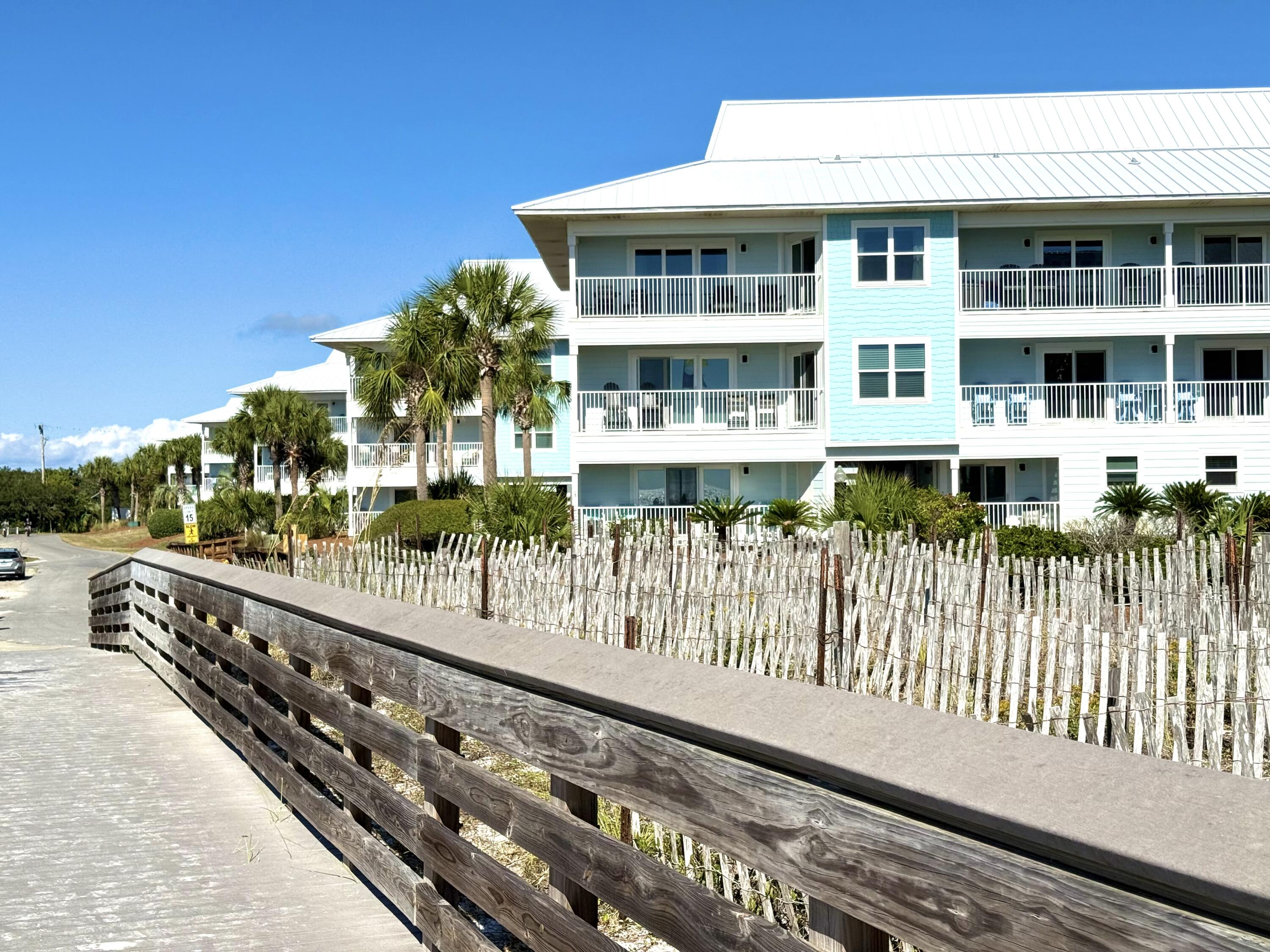 11 Beachside Drive, Unit 912 Santa Rosa Beach, FL 32459 - Photo 11 of 58 a front view of a building with glass door