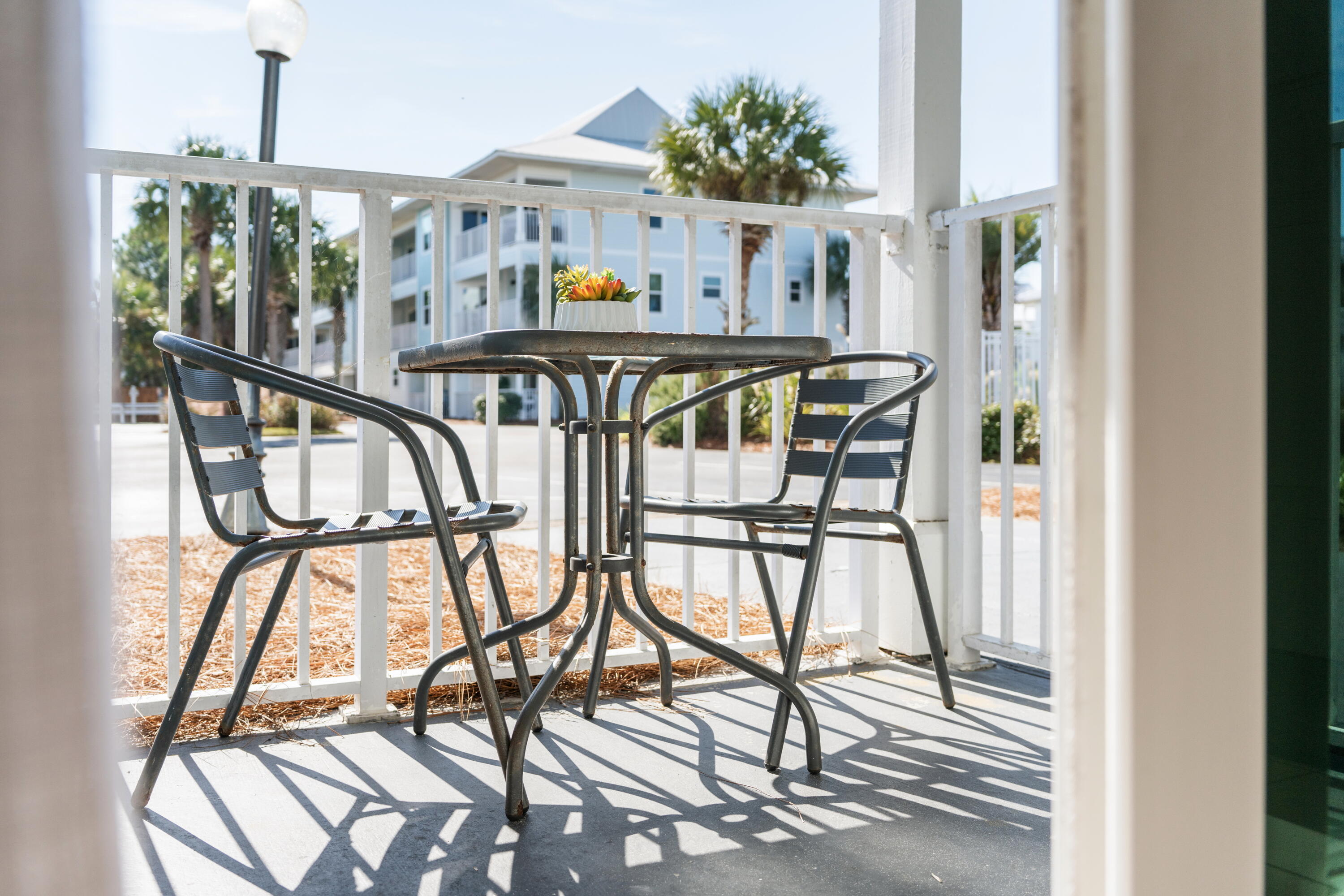 11 Beachside Drive, Unit 912 Santa Rosa Beach, FL 32459 - Photo 16 of 58 a view of an chairs and table in the balcony