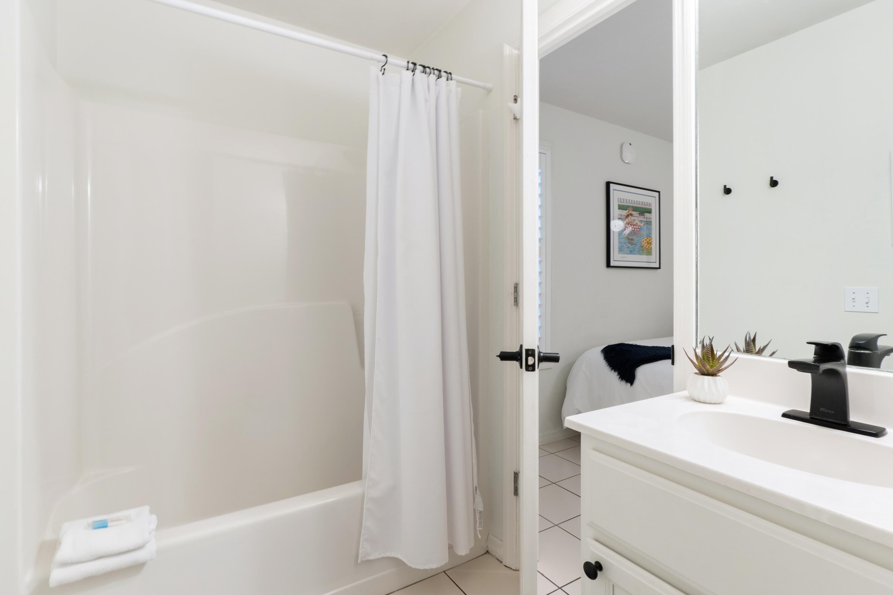 11 Beachside Drive, Unit 912 Santa Rosa Beach, FL 32459 - Photo 27 of 58 a bathroom with a sink a toilet and shower