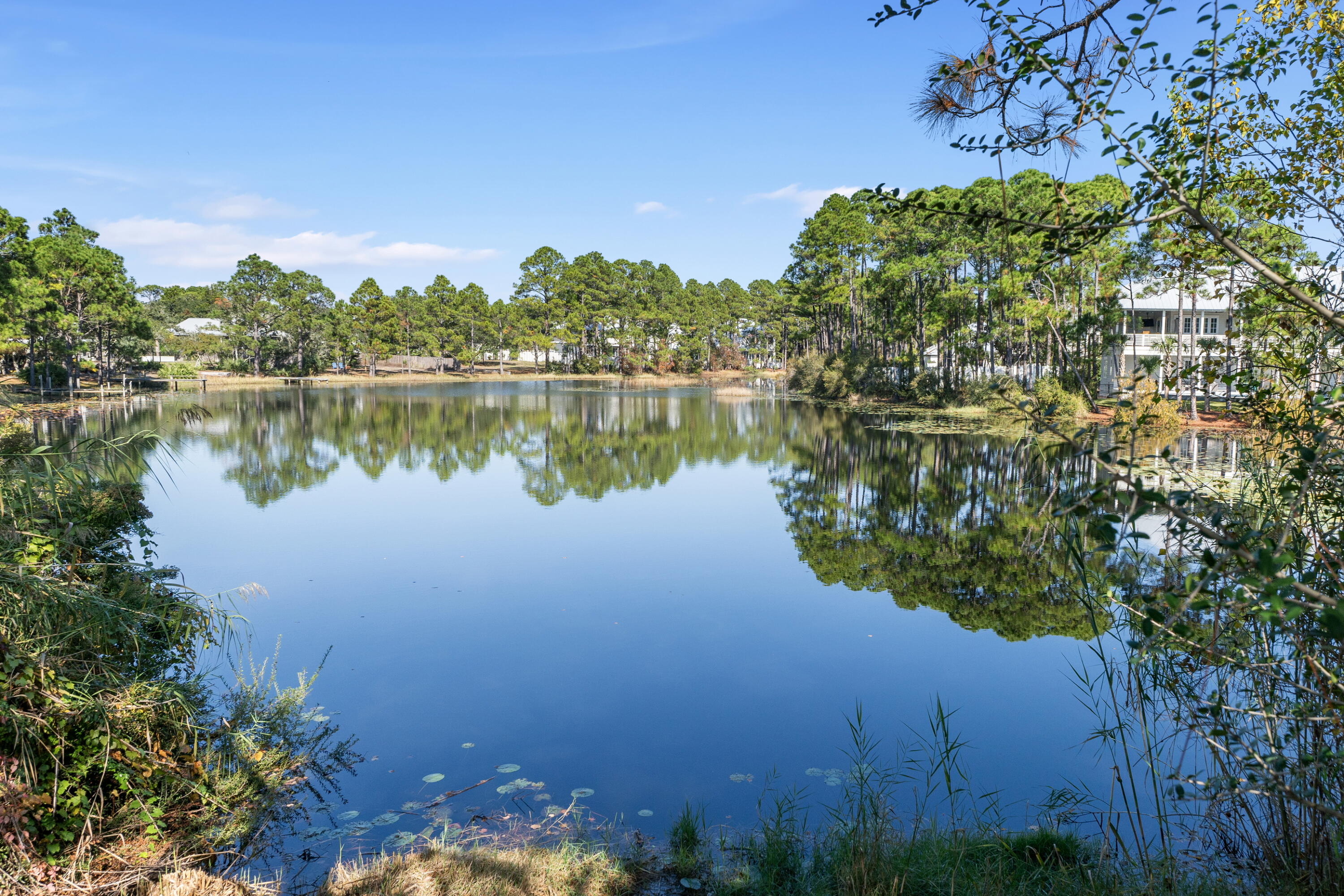 11 Beachside Drive, Unit 912 Santa Rosa Beach, FL 32459 - Photo 45 of 58 a view of a lake with a house in the background