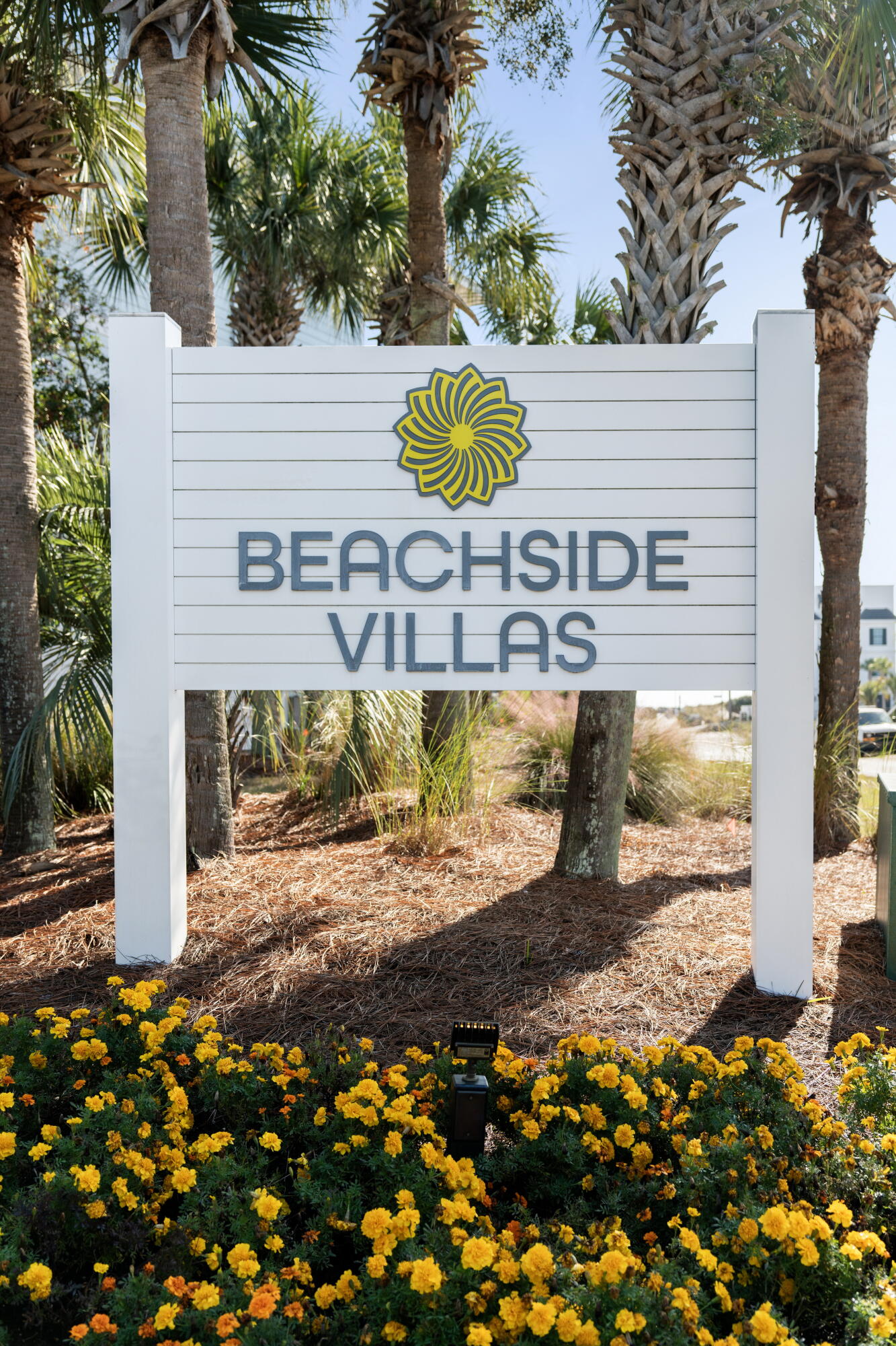 11 Beachside Drive, Unit 912 Santa Rosa Beach, FL 32459 - Photo 58 of 58 a wooden sign that is on the side of a road
