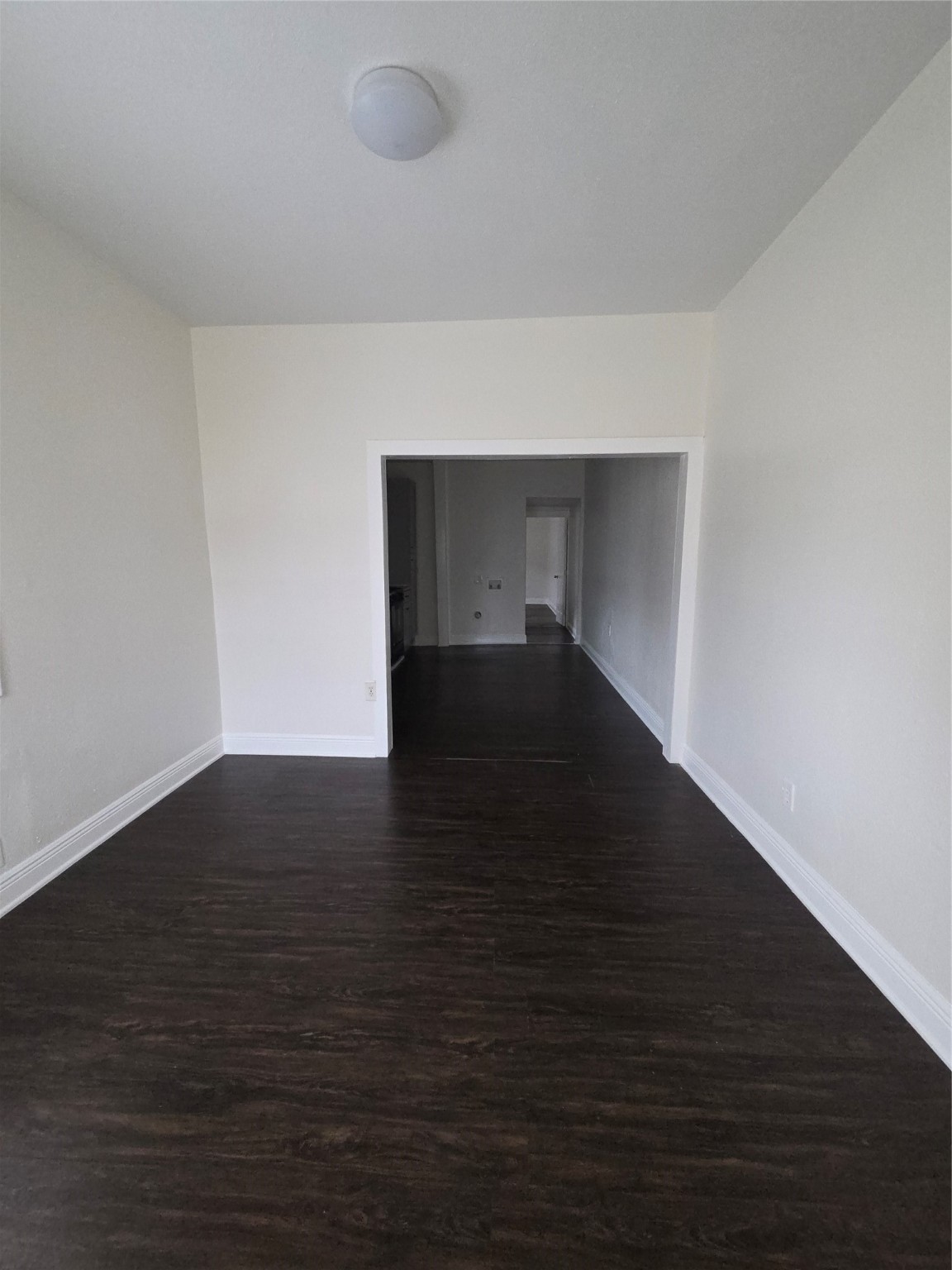 7902 Hudson Street, Unit B Houston, TX 77012 - Photo 4 of 6 a view of empty room with wooden floor