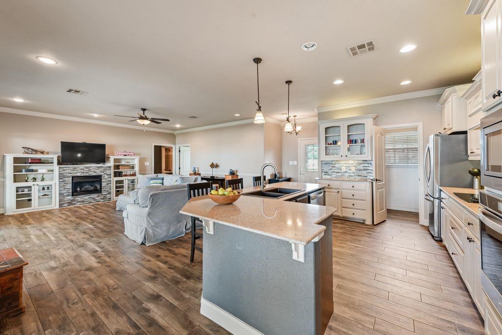 13026 Rudy's Way Streetman, TX 75859 - Photo 13 of 40 a large kitchen with stainless steel appliances lots of counter space
