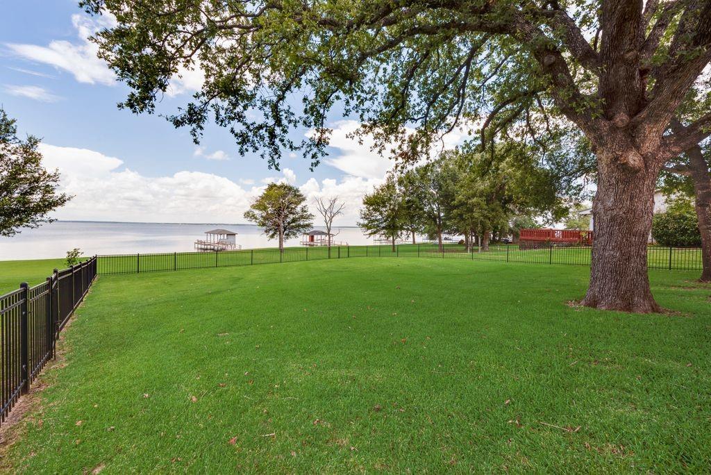 13026 Rudy's Way Streetman, TX 75859 - Photo 29 of 40 The large shaded yard is fenced in to keep the kids and pups contained!