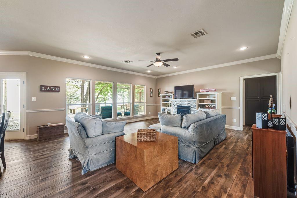 13026 Rudy's Way Streetman, TX 75859 - Photo 8 of 40 a living room with furniture and a large window