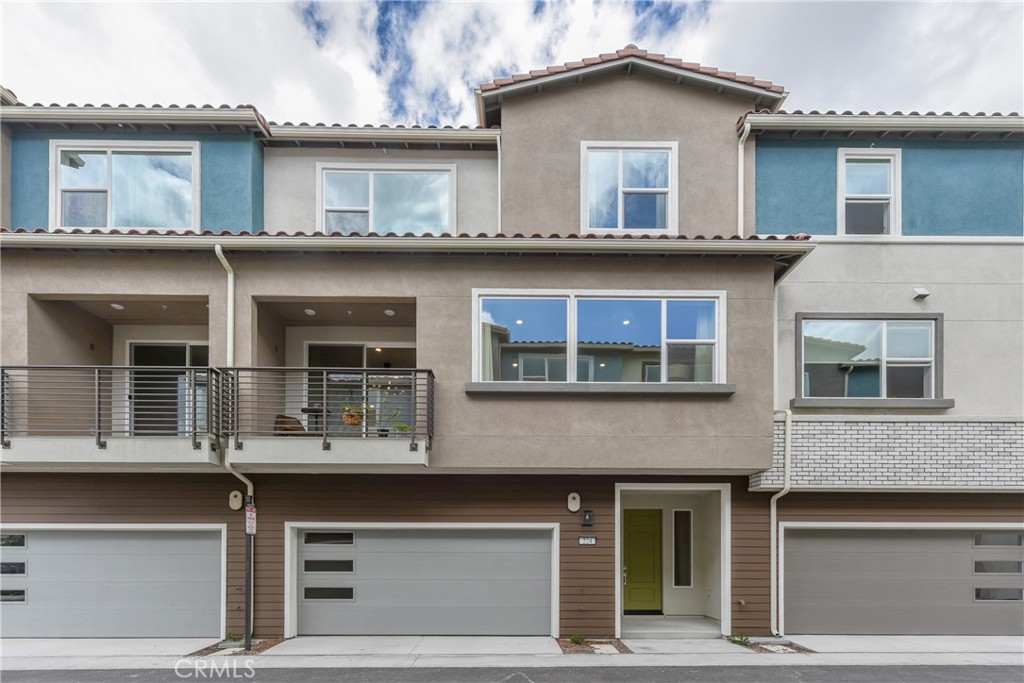 224 Siena Lake Forest, CA 92630 - Photo 1 of 46 a view of a building with a lot of windows