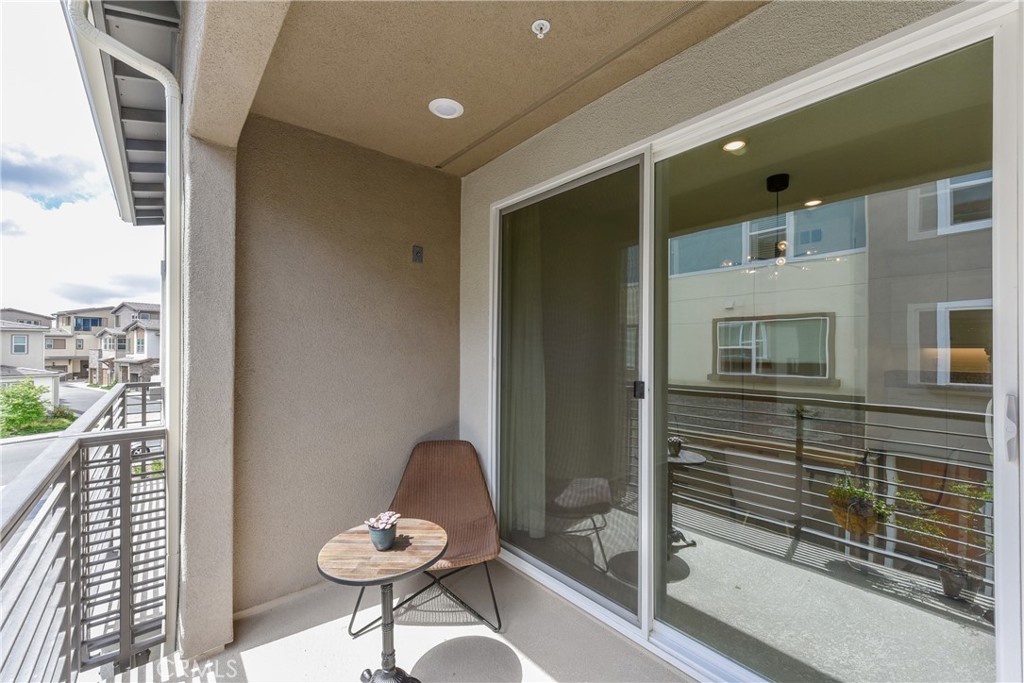 224 Siena Lake Forest, CA 92630 - Photo 16 of 46 a bathroom with a granite countertop sink and a mirror