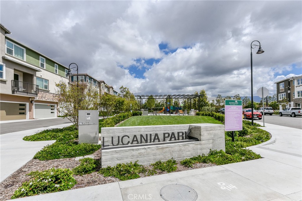 224 Siena Lake Forest, CA 92630 - Photo 30 of 46 a view of a street with a sign on the wall