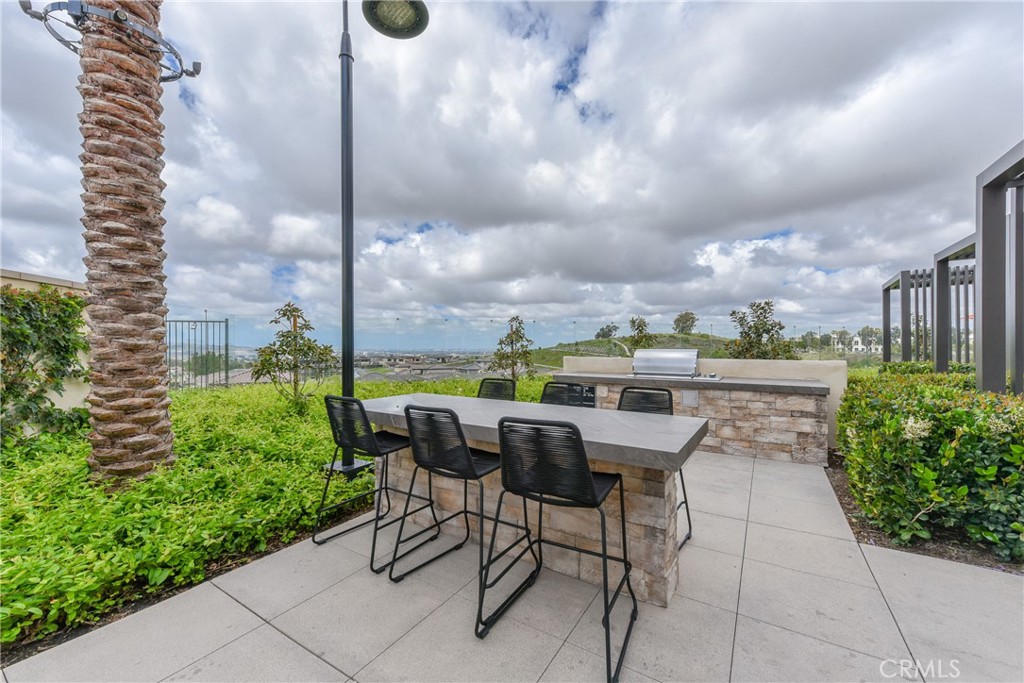 224 Siena Lake Forest, CA 92630 - Photo 34 of 46 a view of yard from terrace with seating space