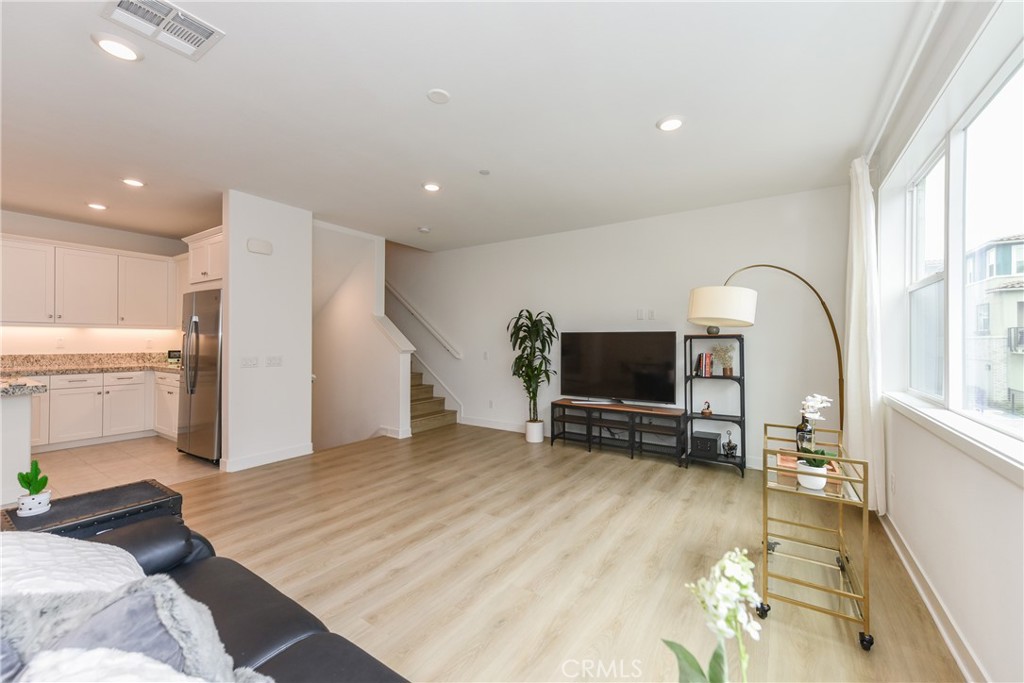224 Siena Lake Forest, CA 92630 - Photo 8 of 46 a living room with furniture and a flat screen tv
