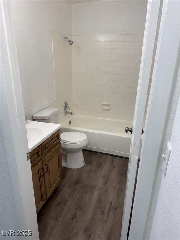 2377 Exeter Drive, Unit 3 Las Vegas, NV 89156 - Photo 10 of 13 Bathroom featuring vanity, wood finished floors, and tub / shower combination