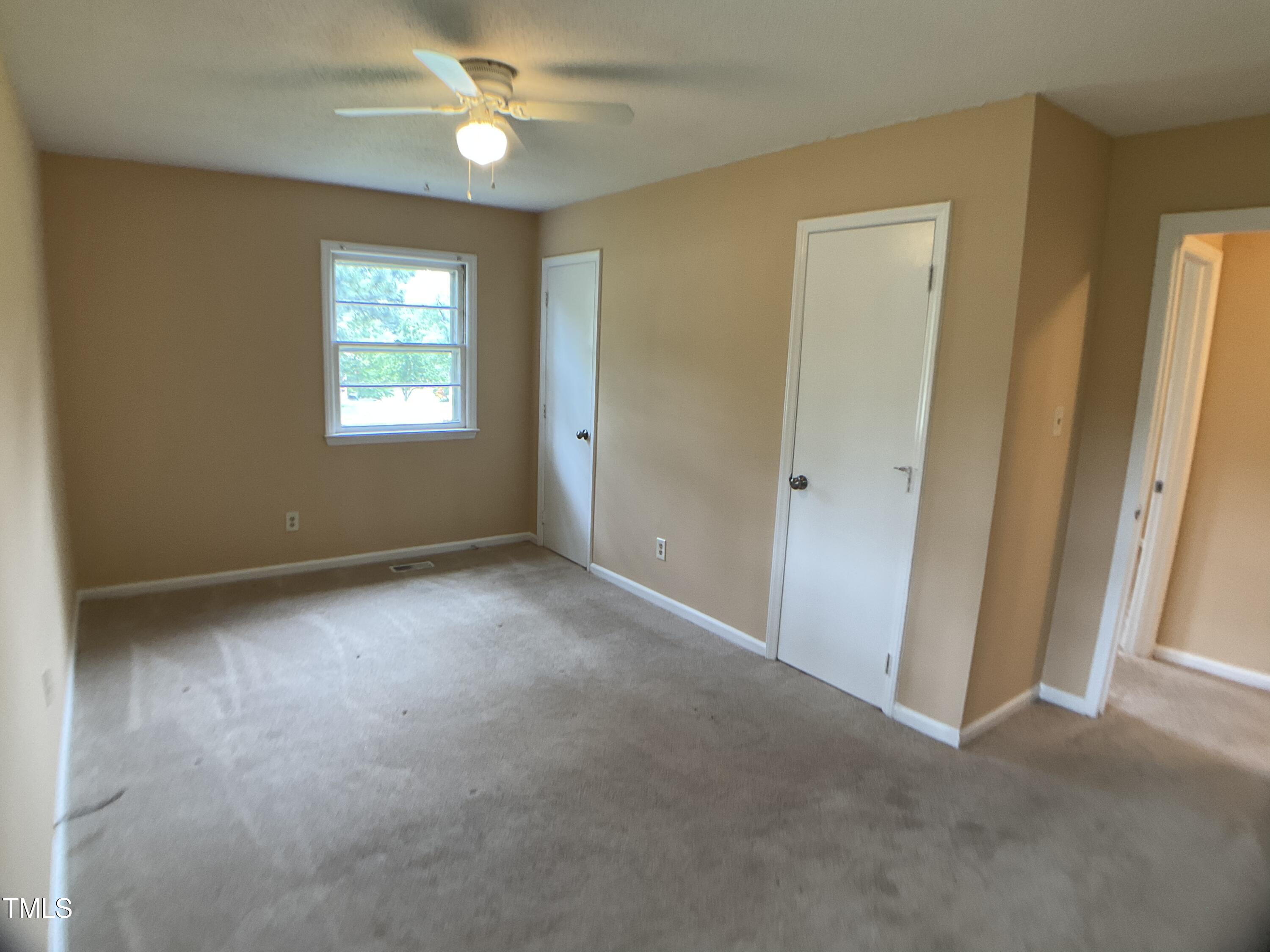 2915 Ross Road Durham, NC 27703 - Photo 13 of 21 a view of an empty room with a window