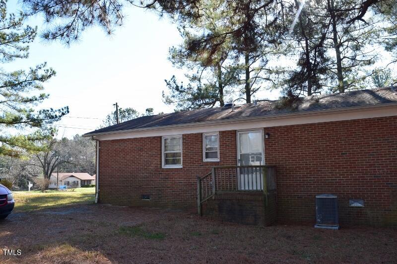 2915 Ross Road Durham, NC 27703 - Photo 17 of 21 a front view of a house with a yard