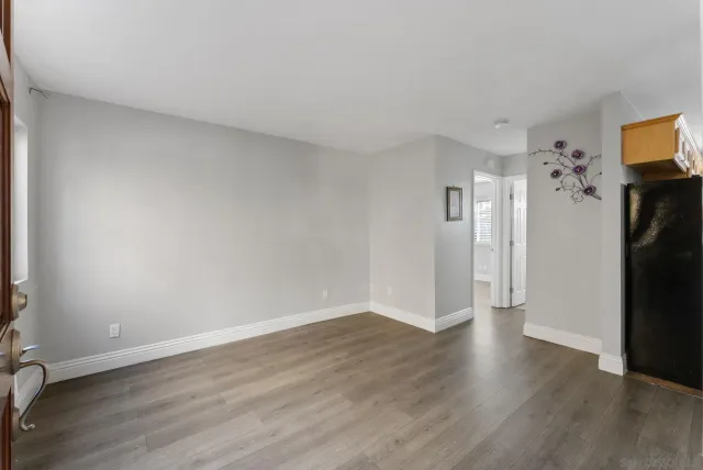 a view of a livingroom with wooden floor