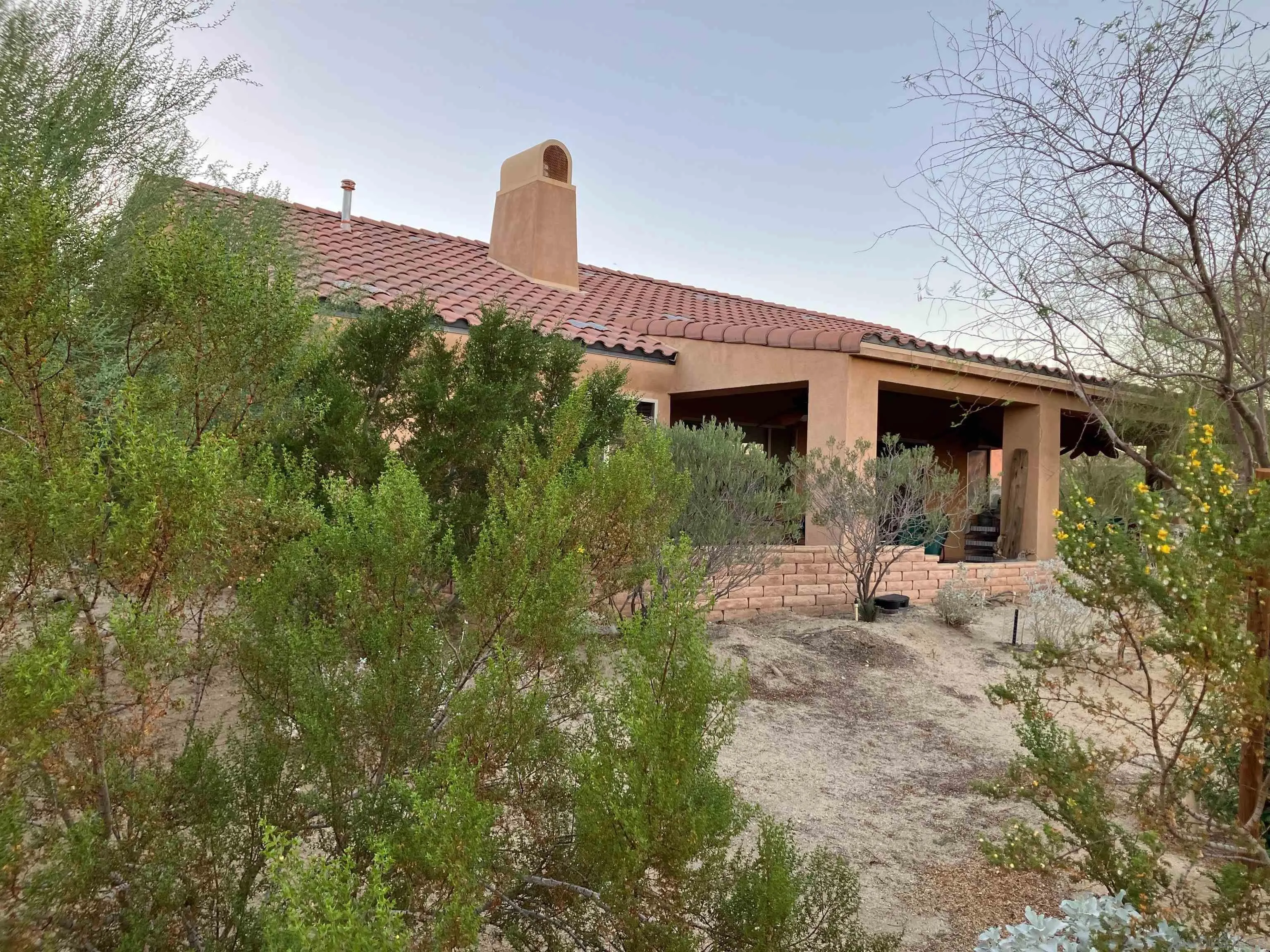 3277 Frying Pan Road Borrego Springs, CA 92004 - Photo 42 of 43 a front view of a house with garden
