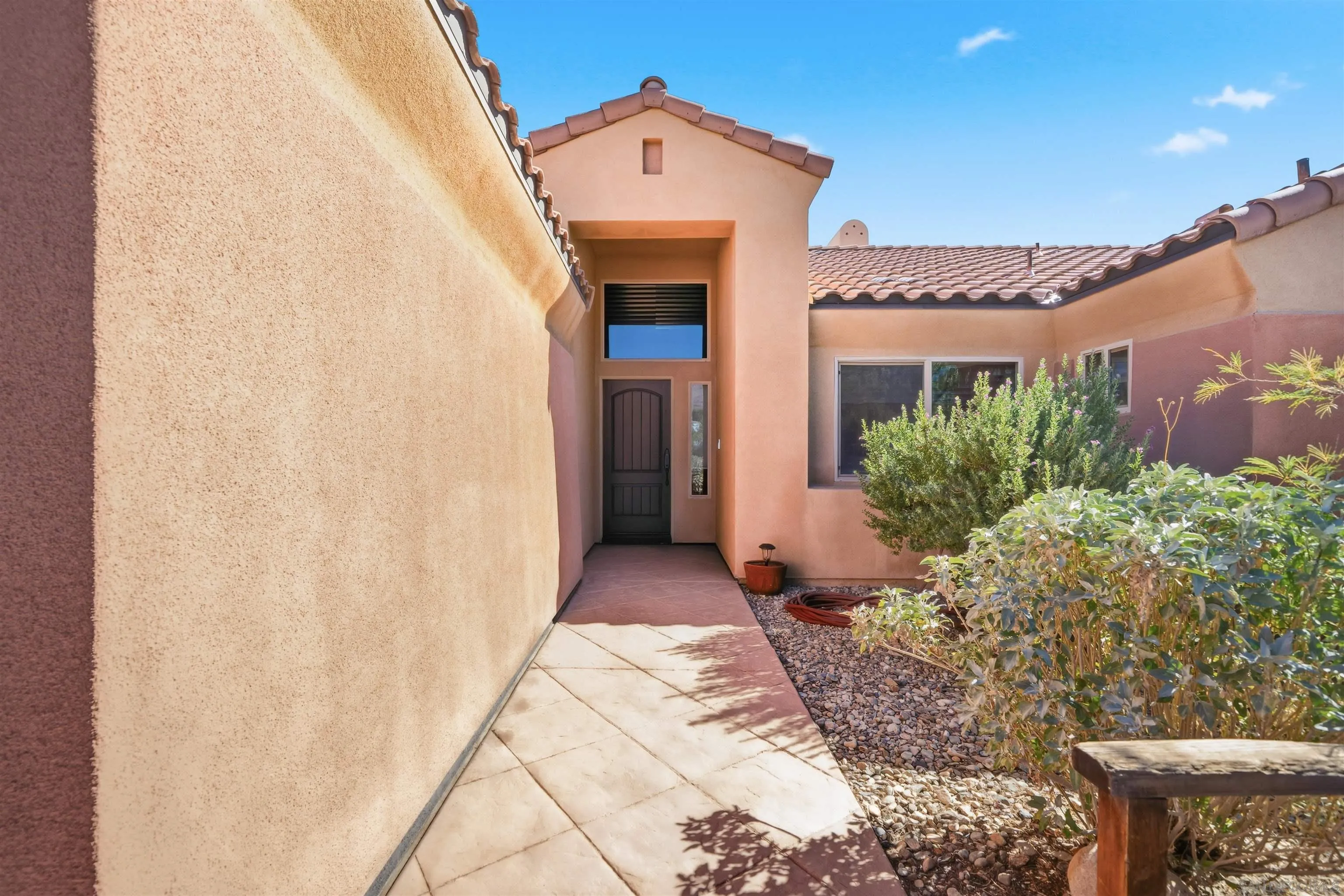 3277 Frying Pan Road Borrego Springs, CA 92004 - Photo 5 of 43 a front view of a house with a yard