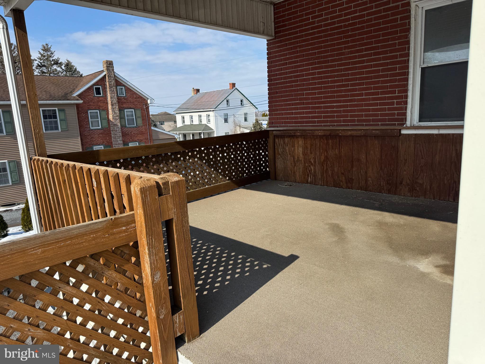 404 Linden Grove Road Ephrata, PA 17522 - Photo 15 of 16 a view of a brick house with wooden fence