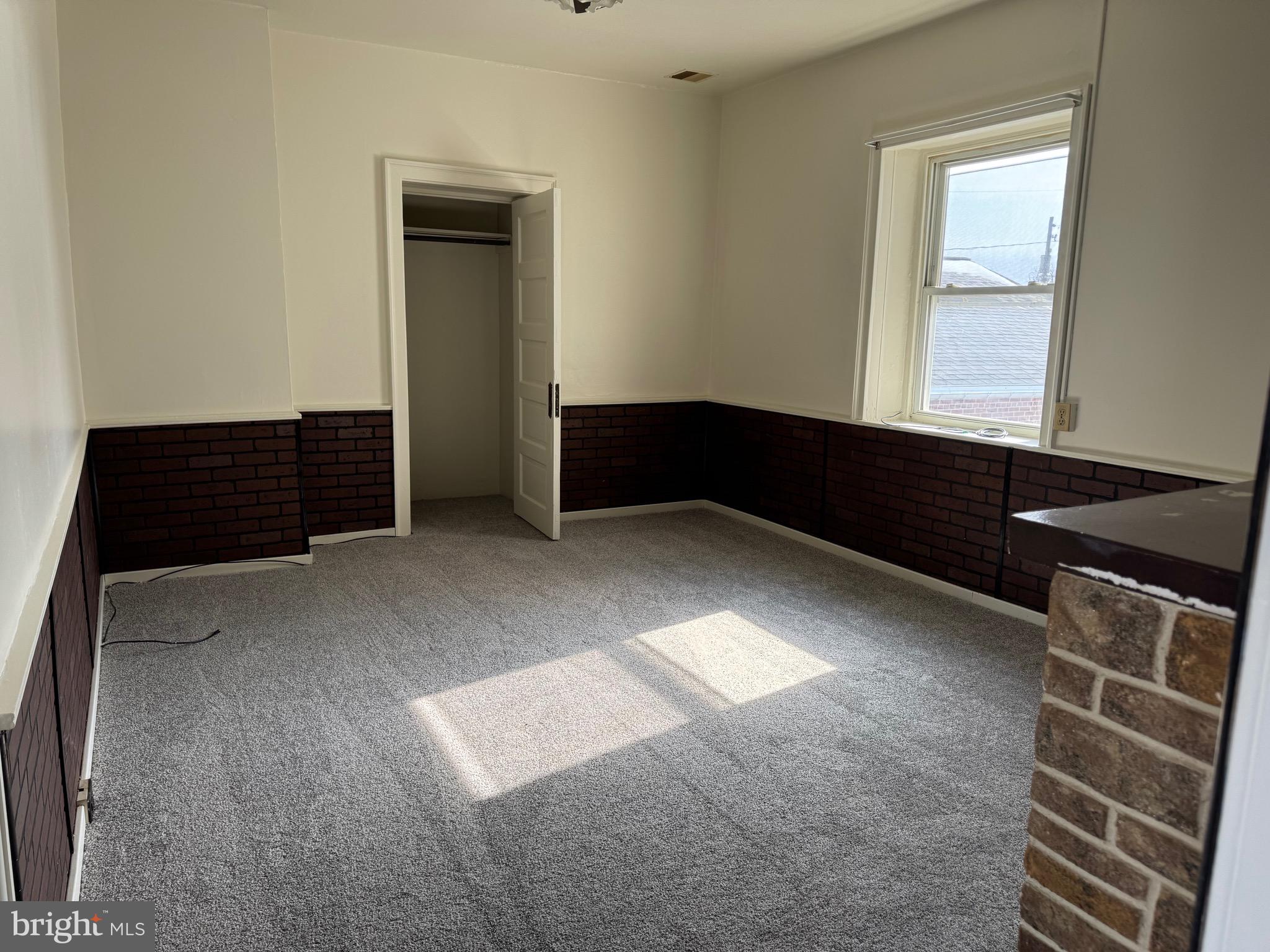 404 Linden Grove Road Ephrata, PA 17522 - Photo 4 of 16 a view of an empty room and window
