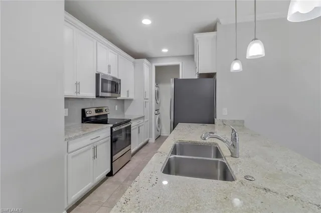 $435,000 | 7948 Bristol Circle, Naples, FL 34120