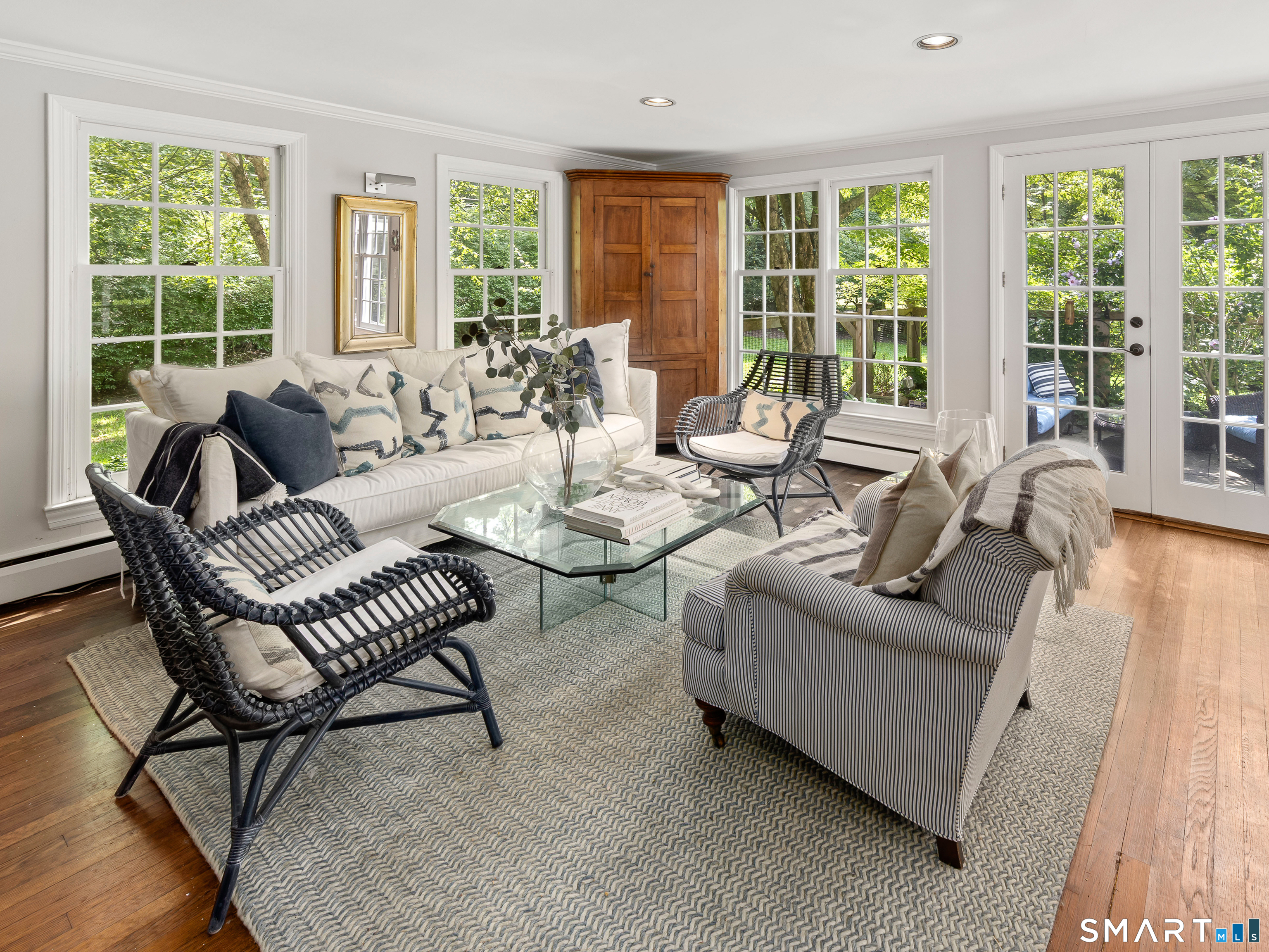 24 Good Hill Road Weston, CT 06883 - Photo 7 of 36 The main living room is flanked by windows on both sides