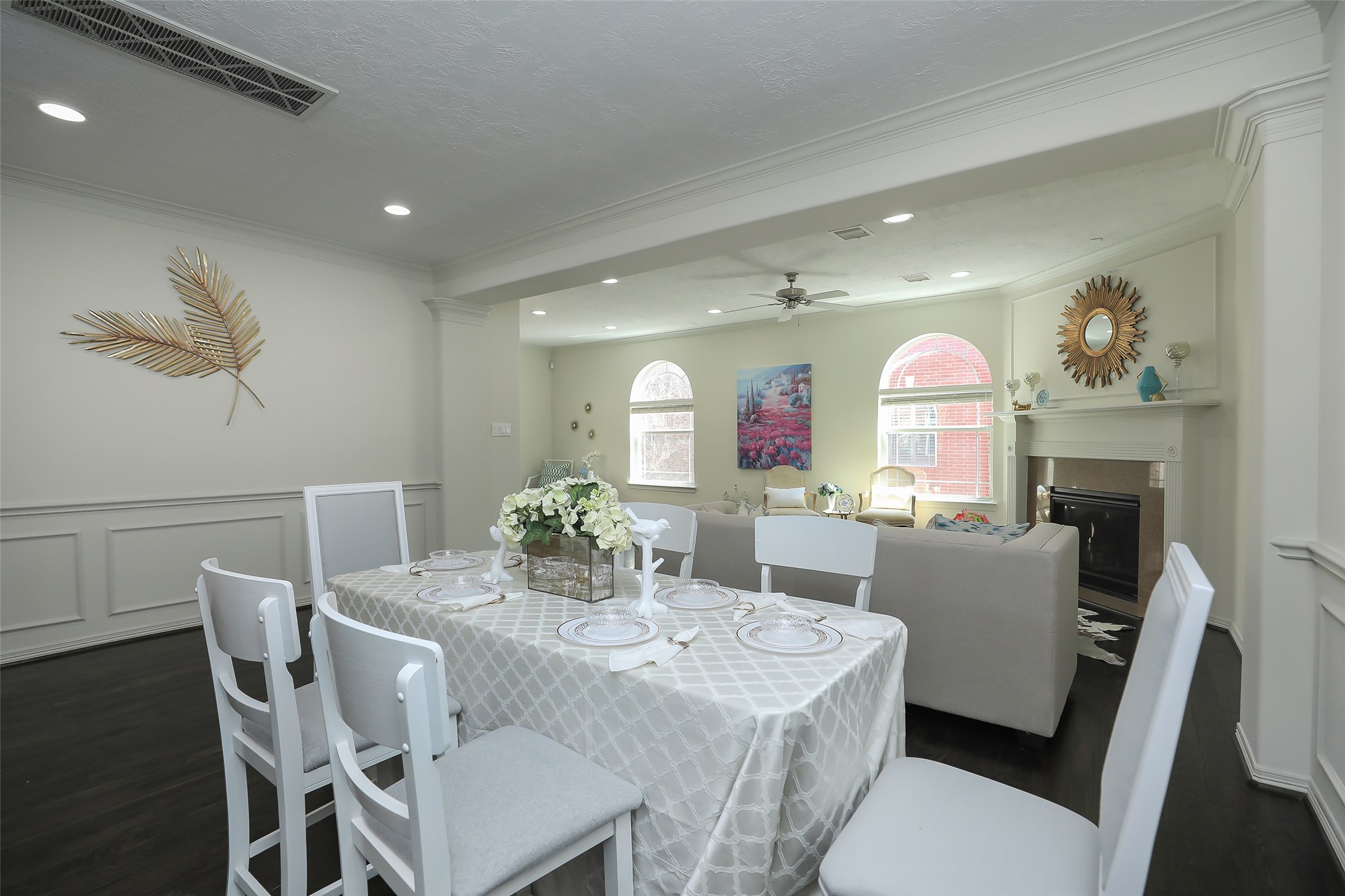 1311 Bingham Street, Unit B Houston, TX 77007 - Photo 10 of 29 a view of a dining room with furniture and a chandelier