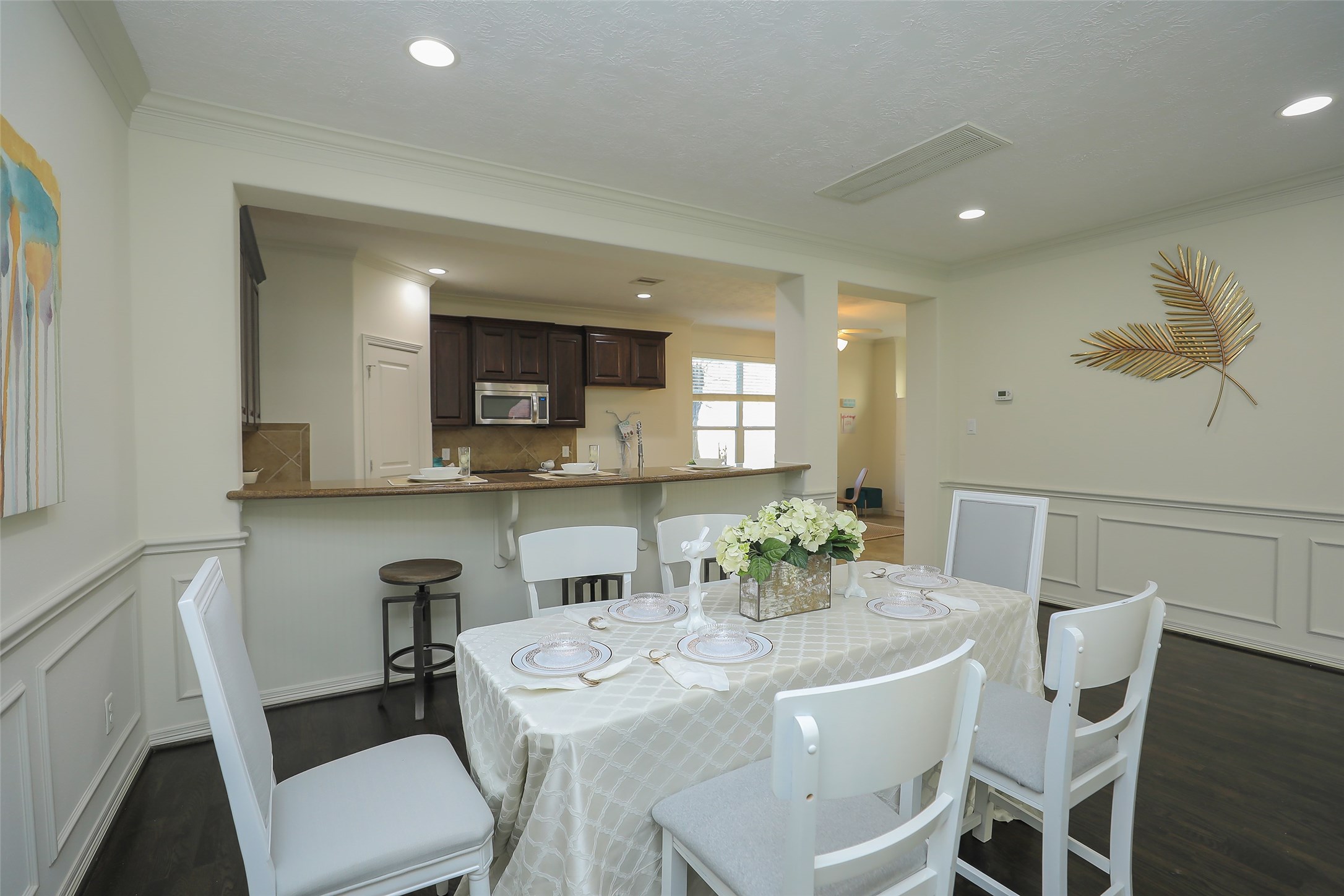 1311 Bingham Street, Unit B Houston, TX 77007 - Photo 11 of 29 a view of a dining room with furniture and wooden floor