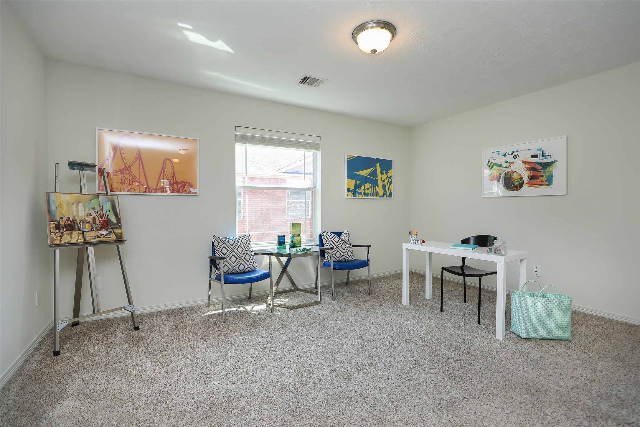 1311 Bingham Street, Unit B Houston, TX 77007 - Photo 18 of 29 a living room with furniture and a window