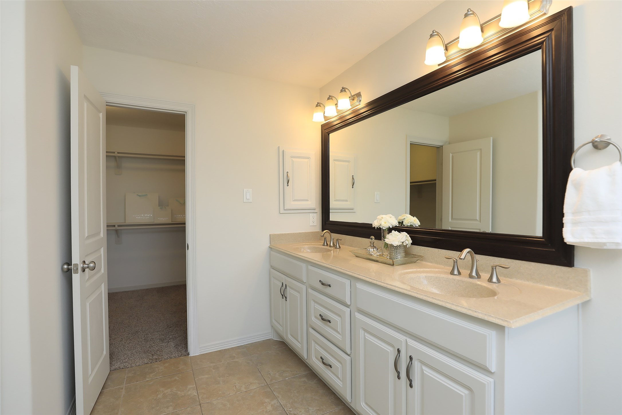1311 Bingham Street, Unit B Houston, TX 77007 - Photo 22 of 29 a bathroom with a double vanity sink and a mirror