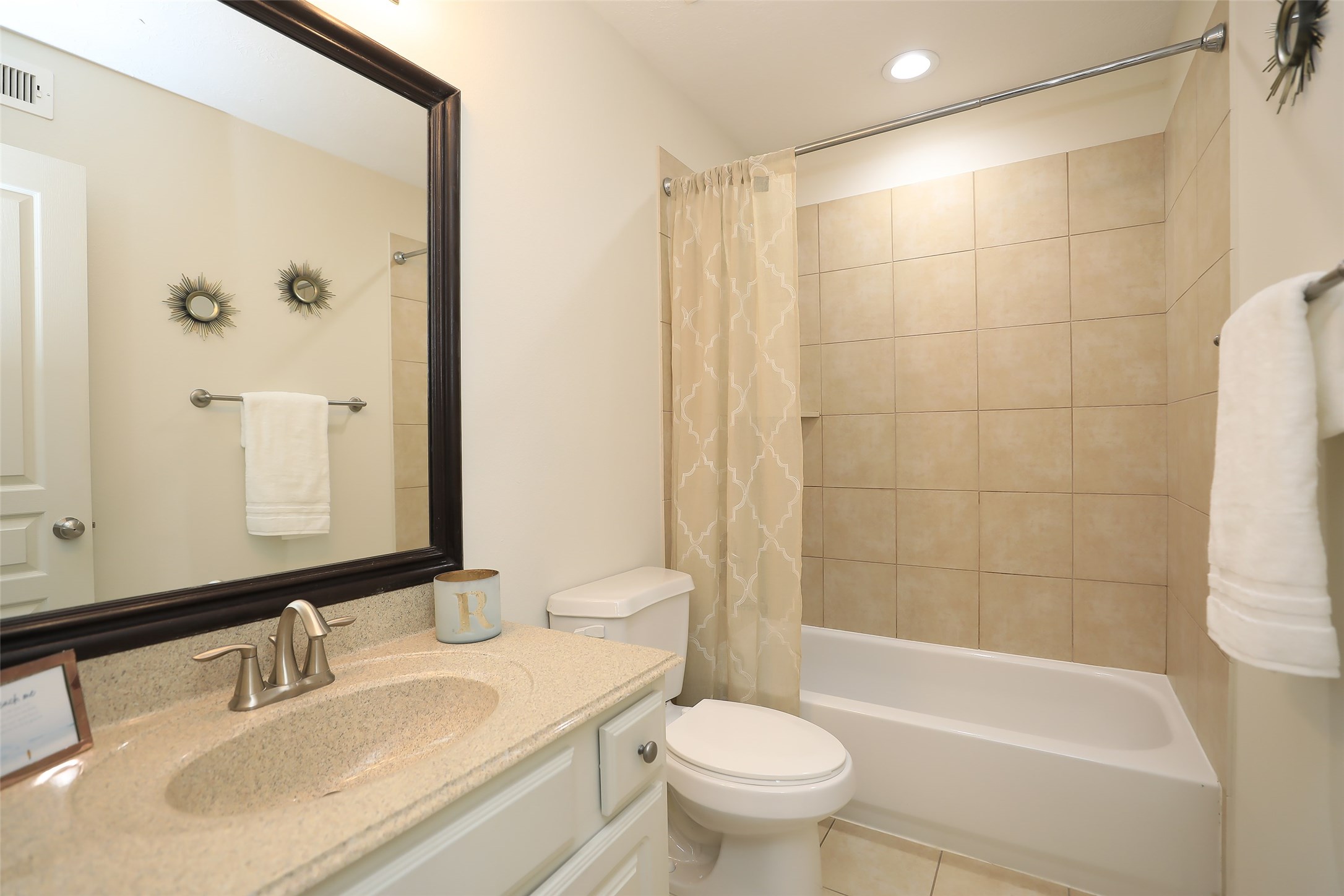 1311 Bingham Street, Unit B Houston, TX 77007 - Photo 6 of 29 a bathroom with a sink and a mirror