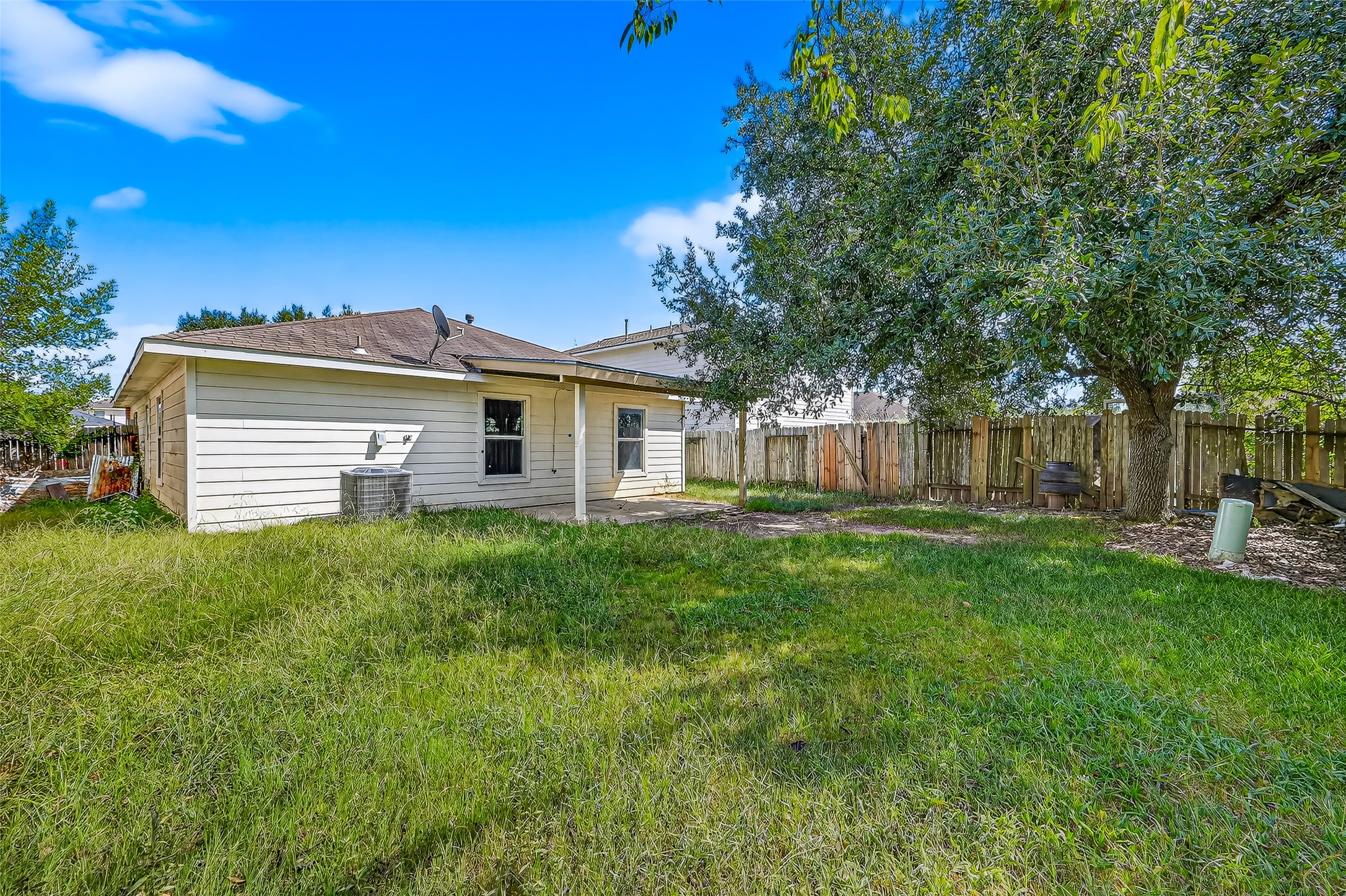 22819 Cabanna Road Spring, TX 77389 - Photo 26 of 26 a view of a house with backyard and sitting area