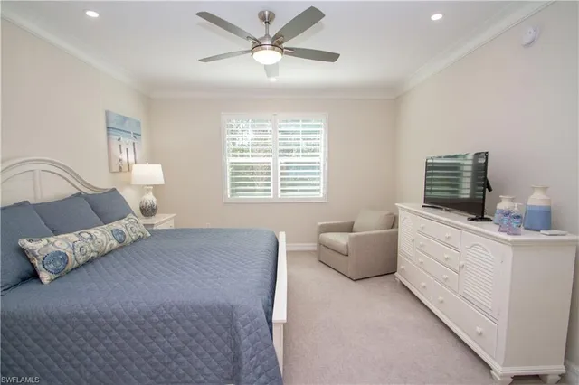 a bed room with furniture and a window