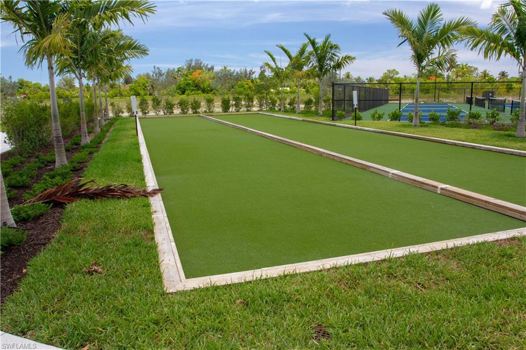 232 Indies Drive East, Unit 101 Naples, FL 34114 - Photo 48 of 50 a view of a tennis court